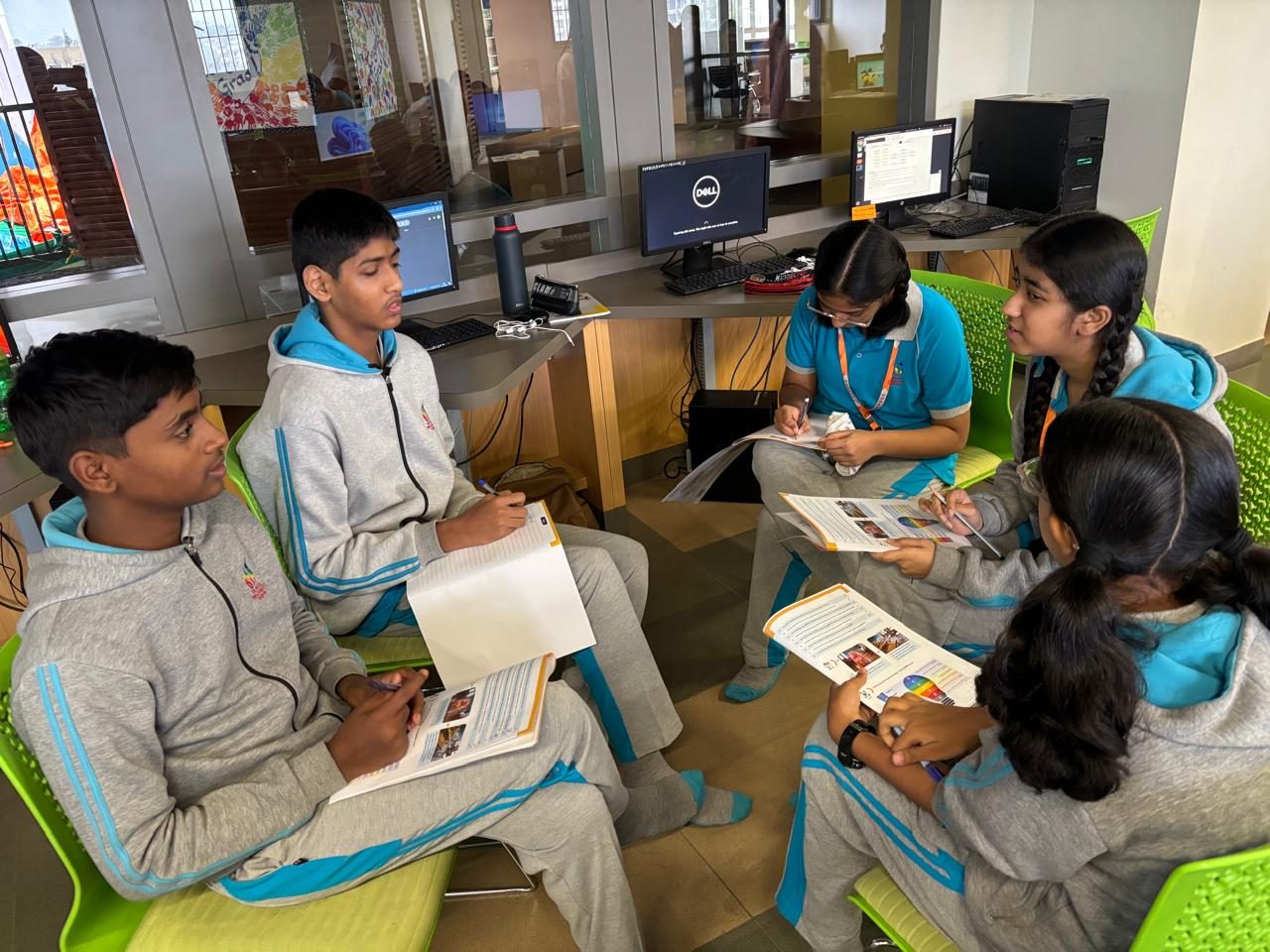 A small group of students working through a case discussion in a circle